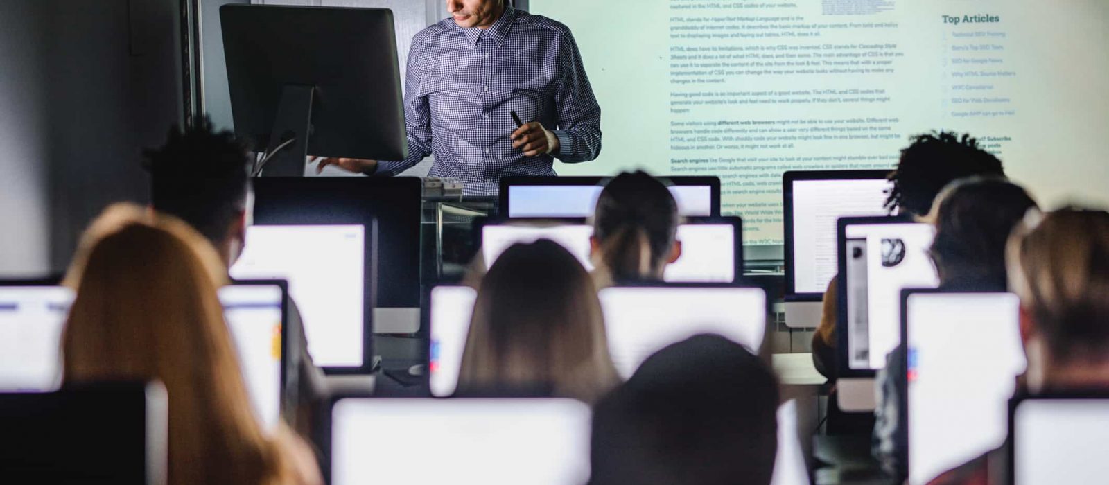 students on their computers at school